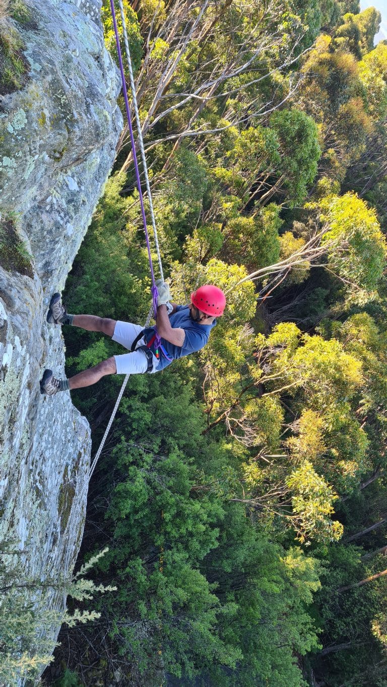 A man doing abseiling